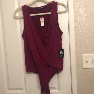 Brand new! Berry Red sleeveless body suit. Size medium